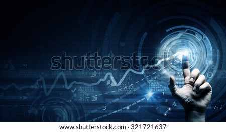 Close up of businessman touching virtual panel with finger