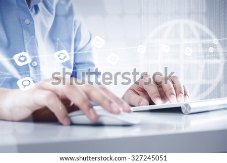 Hands of businessman working with keyboard and mouse