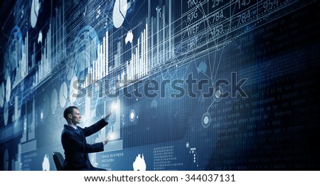 Businessman in chair working with virtual panel