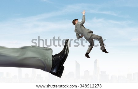 Businessman kicked by his boss big foot