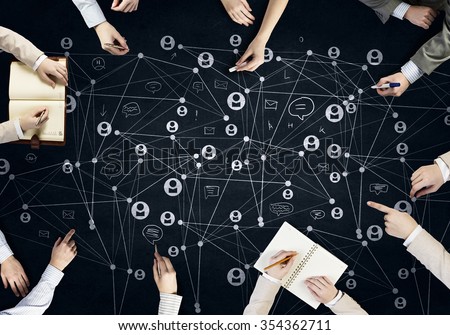 Top view of people hands drawing networking strategy