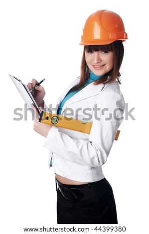 The young charming girl the builder with the measuring tool isolated on white