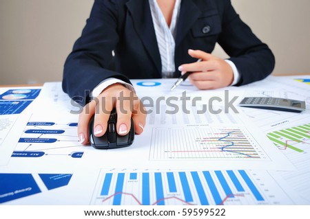 Workplace businessman. Charts, securities, charts on your desktop