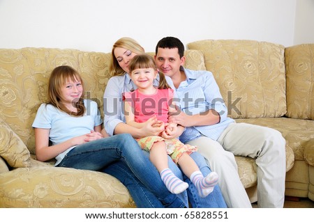 Mom, Dad and their two daughters to spend time together, socialize and enjoy life