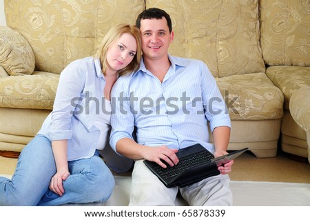 A young couple spends time together in the interior