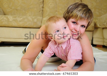 Mom and son having fun together. symbol of family