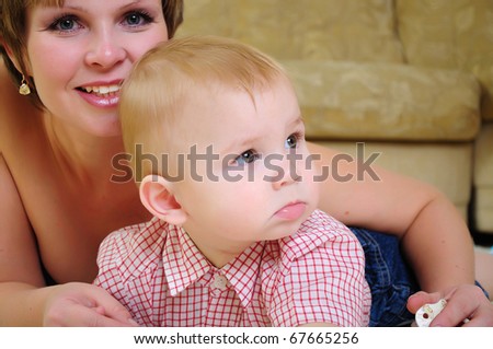 Mom and son having fun together. symbol of family