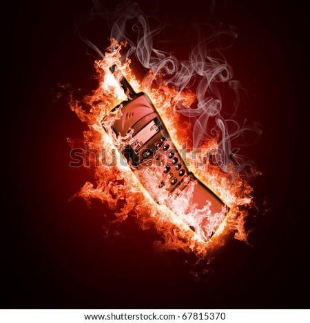 Phone in open fire on a black background