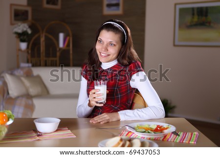 a young girl cooking  healthy food at home