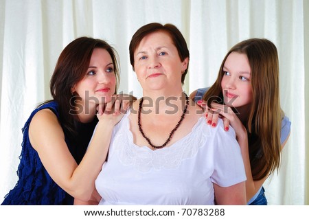 three generations of women together - mother, daughter and grandmother
