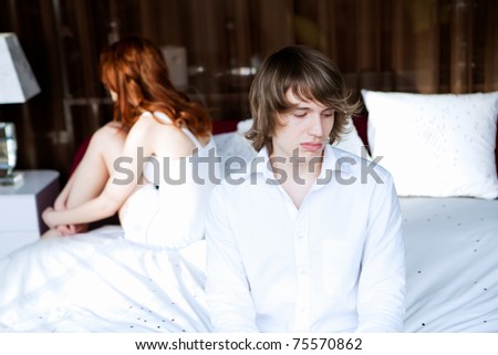 picture of couple in disagreement in bedroom