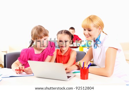 Laptop Deals  Students on Teacher Deals With Students For A Laptop At School Stock Photo