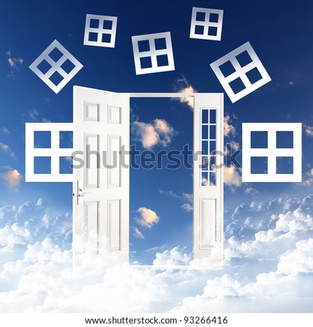Picture of a white door against blue sky background