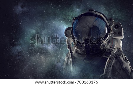 Spaceman in astronaut suit. Mixed media