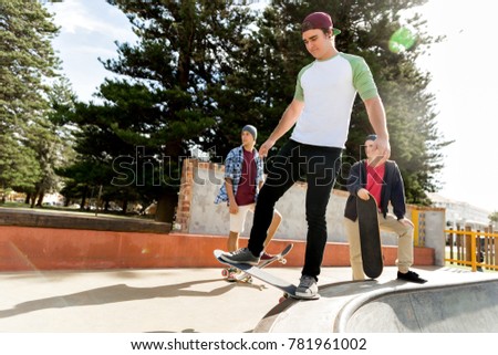 Teenage boy skateboarding outdoors