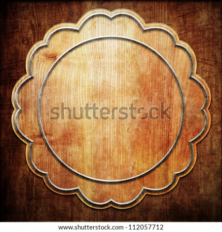 carved frame  on wooden texture
