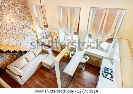 Modern art nouveau style two-high living-room interior with staircase, top view