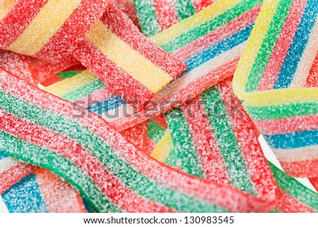 Multicolor gummy candy (licorice) sweets closeup food background