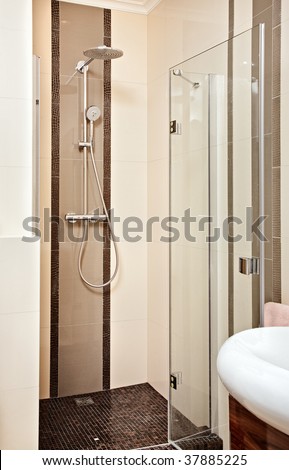 Shower cubicle in beige tones