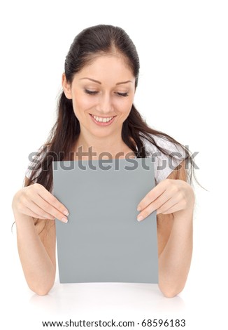 Young beautiful lady holding blank gray card isolated on white