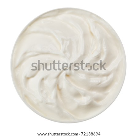 Sour cream in small round plate, isolated on white