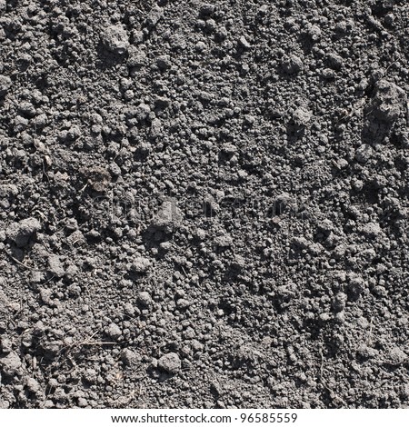 Cultivated gray dried soil, nature background