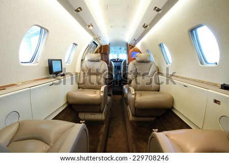 Inside the rear part of the business aircraft cabin