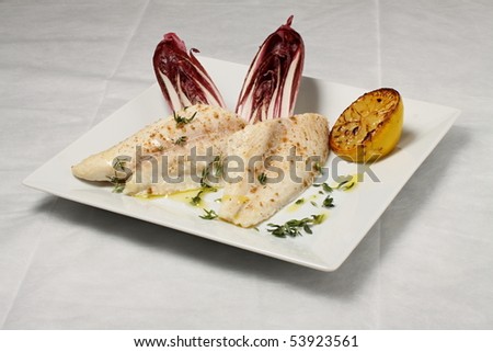 Cooked fish meat with vegetables