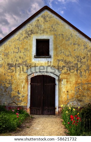 Old house facade with country shop door