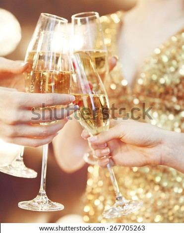 Celebration or party. People holding glasses of champagne making a toast