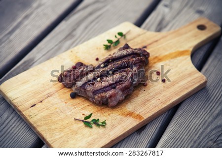 BBQ steak. Barbecue grilled beef steak meat. Healthy food. Barbeque steak dinner