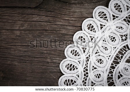 White lace on the wooden background