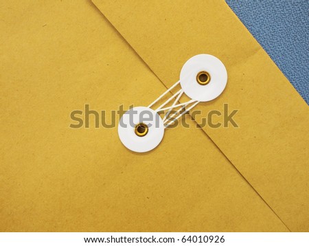 Closeup of the flip of a string envelope