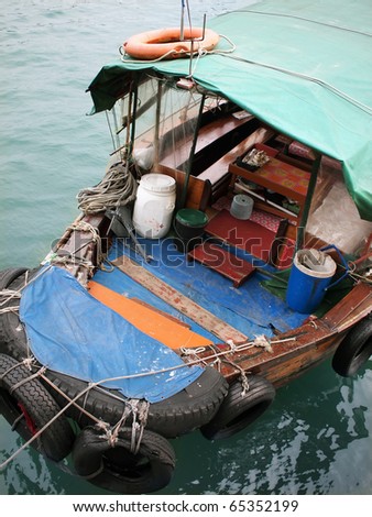 Traditional Chinese fisherman\'s boathouse in a pier in Hong Kong