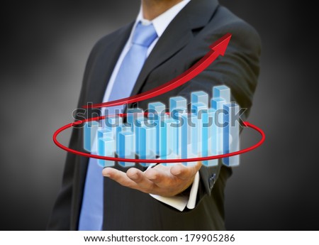 Businessman using a 3D chart during a meeting