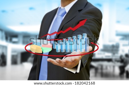 Businessman using a digital chart during a meeting
