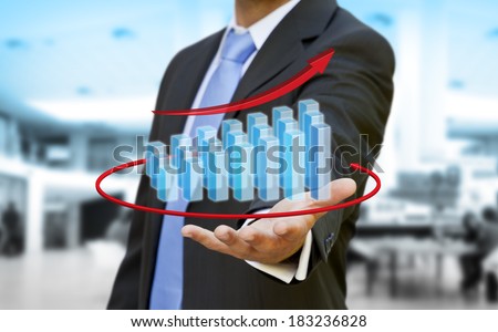 Businessman using a digital chart during a meeting