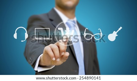 Businessman using digital interface to shop online
