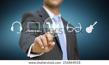 Businessman using digital interface to shop online