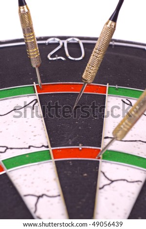 three darts in dart board