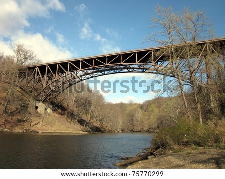 Cantilever Bridge and small river running to Hudson