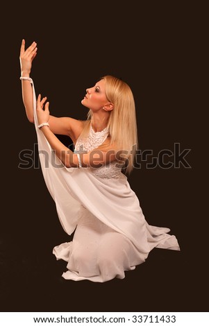 The dancing girl in a white suit