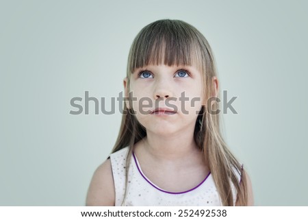 Cute little girl serious portrait