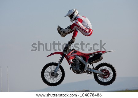 GALWAY, IRELAND - MAY 26: Dave Wiggins freestyle motocross rider jumps through the air during The  Extreme Stunt Show on May 26, 2012 in Galway, Ireland
