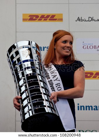 GALWAY, IRELAND - JULY 7: Galway Rose,Anna de Paor holding the trophy for the first place overall in the Volvo Ocean Race 2011-12,at the final public prize giving  , on July 7,2012 in Galway, Ireland.