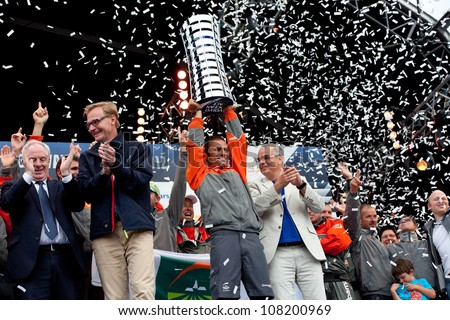 GALWAY, IRELAND - JULY 7: Skipper F. Cammas, Groupama ,with the trophy for the first place overall in the Volvo Ocean Race 2011-12, at the final prize giving, on July 7, 2012 in Galway, Ireland.