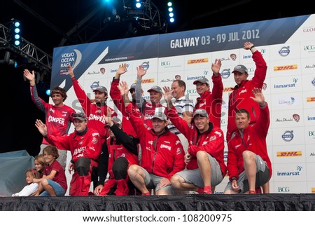 GALWAY, IRELAND - JULY 7: Skipper Chris Nicholson and CAMPER team, with the award for second  place in the Discover Ireland In-Port Race, during the VOR 2011-12, on July 7, 2012 in Galway, Ireland.