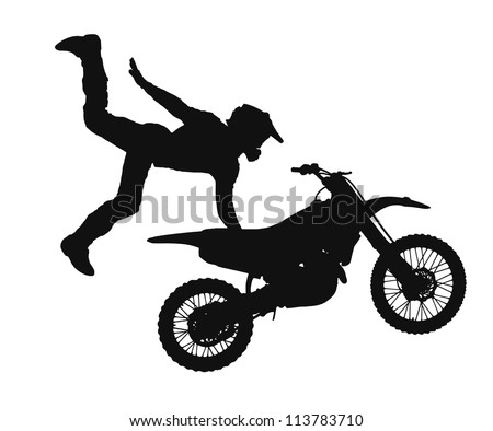 silhouette of freestyle motocross rider jumping through the air