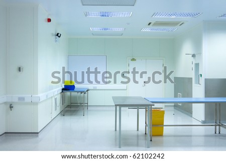 clean room with tables in medical packaging plant interior
