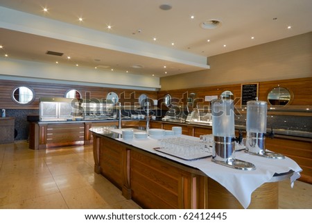 restaurant interior self-service area with trays and clean crockery